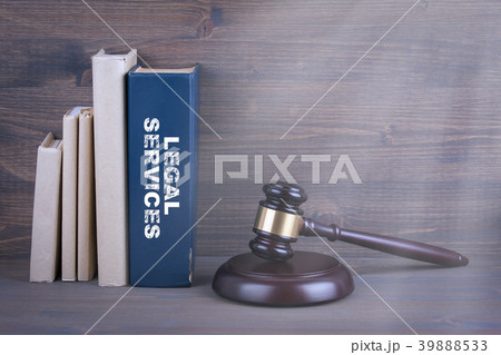 Legal Services. Wooden gavel and books in background. Law and justice concept 39888533
