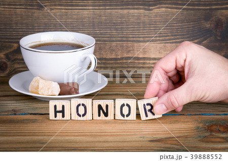 honor. Wooden letters on the office desk, informative and communication background 39888552