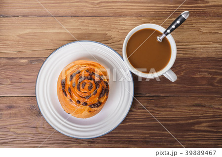 chocolate bun and cup of coffee 39889467
