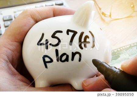 Piggy bank with sign 457f plan. Pension plan. 39895050