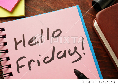 Notebook with the words Hello Friday on the table. 39895153