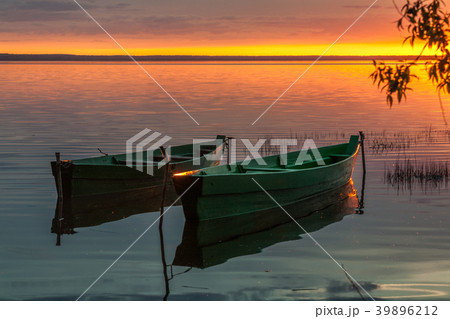 two boats at sunset 39896212