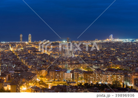 Barcelona city skyline during evening in Spain Barcelona city skyline during evening in Spain 39896936