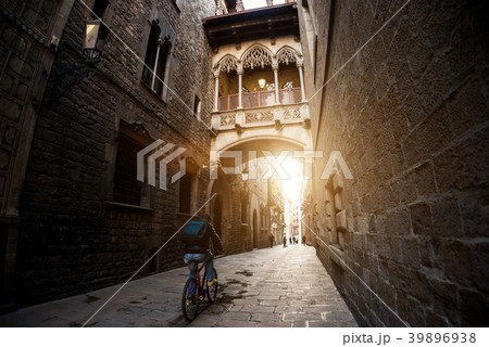 Barcelona people biking bicycle in Barri Gothic  39896938
