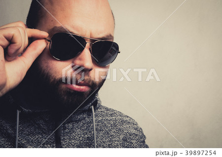Handsome young man in sunglasses. Handsome young man in sunglasses. 39897254
