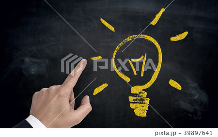 Hand pointing on lightbulb concept 39897641