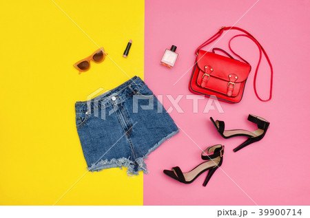 Denim shorts,black shoes, red handbag, sunglasses Denim shorts,black shoes, red handbag, sunglasses 39900714