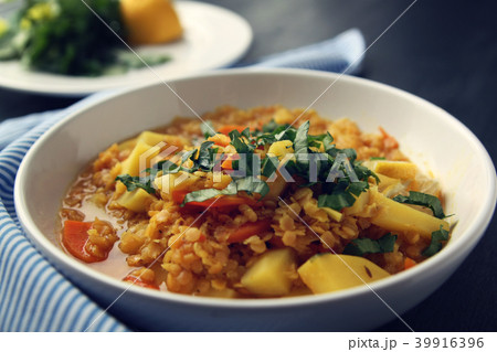 Red lentil stew with potato, carrot and turmeric. Red lentil stew with potato, carrot and turmeric. 39916396