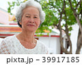 Older Asian women with grayish hair have smiling 39917185