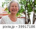 Older Asian women with grayish hair have smiling  39917186