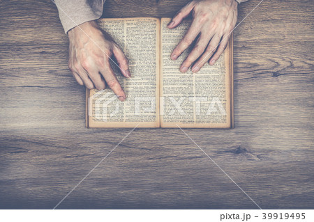 old man hands pointing words on vintage, grunge 39919495