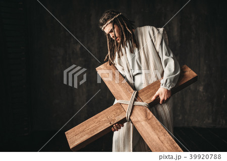 Great martyr with cross, black background Great martyr with cross, black background 39920788
