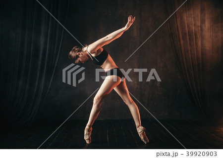 Classical ballet dancer in black practice training Classical ballet dancer in black practice training 39920903