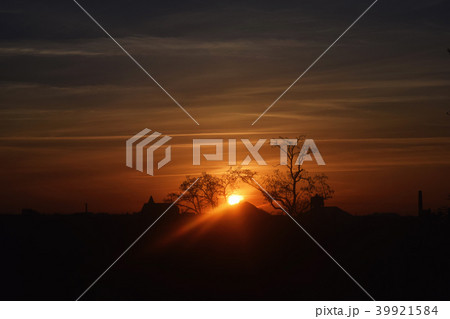 Natural Sunset Sunrise Over Field Or Meadow. 39921584