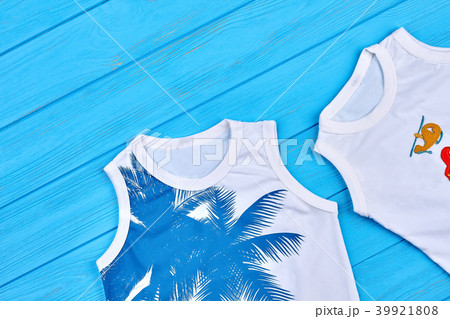 Close up of two cotton childrens t-shirts. Close up of two cotton childrens t-shirts. 39921808