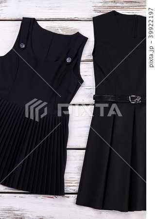 School girls classic black dresses. School girls classic black dresses. 39922197