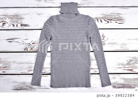 Turtleneck gray knitted sweater. Turtleneck gray knitted sweater. 39922384