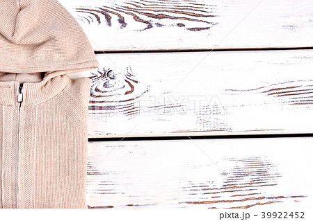 Hooded knitted sweater, copy space. Hooded knitted sweater, copy space. 39922452