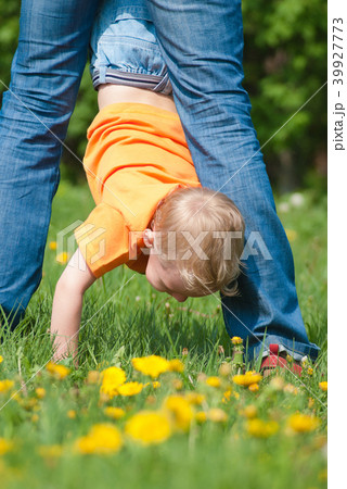 Mother plays with her little son 39927773