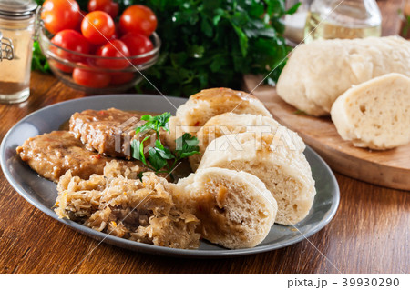 Pork loin in gravy with bread dumplings Pork loin in gravy with bread dumplings 39930290
