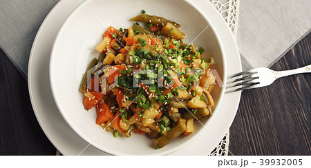 Vegetable stew with carrot and green beans Closeup Vegetable stew with carrot and green beans Closeup 39932005