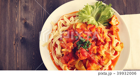 Ribbon pasta with Arrabiata sauce. Vegetarian dish 39932006