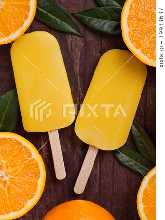 Fresh organic fruit orange ice cream with leaves Fresh organic fruit orange ice cream with leaves 39933637