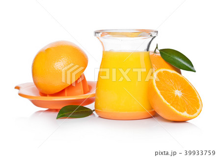 Fresh raw peeled oranges with juice squeezer jar 39933759
