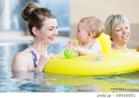 Mothers and kids having fun together playing with 39936001