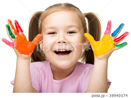 Portrait of a cute girl playing with paints Portrait of a cute girl playing with paints 39940374