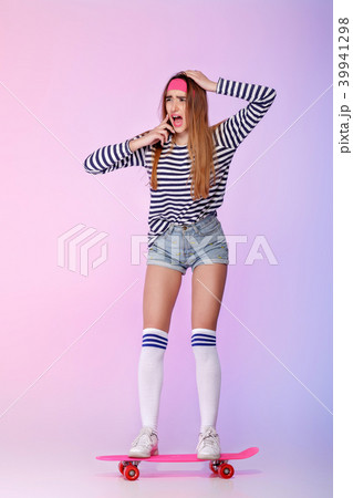 beautiful woman with skate in studio beautiful woman with skate in studio 39941298
