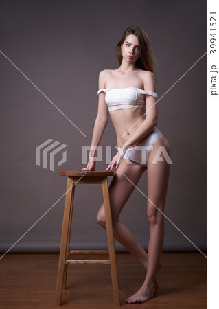 Model posing in studio during classic test shoot Model posing in studio during classic test shoot 39941521