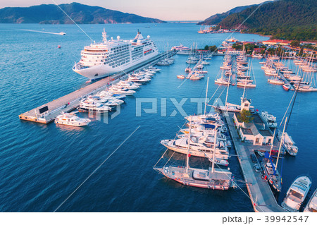 Aerial view of beautiful white ship at sunset Aerial view of beautiful white ship at sunset 39942547