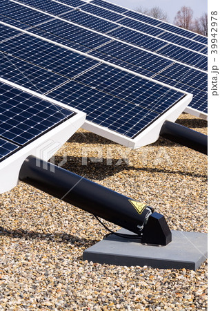 Blue rotating solar panels tilted axis tracker Blue rotating solar panels tilted axis tracker 39942978