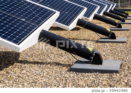 Blue rotating solar panels tilted axis tracker Blue rotating solar panels tilted axis tracker 39942980