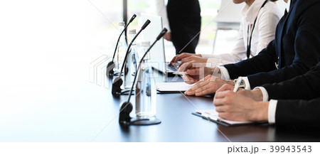 Speakers at business meeting Speakers at business meeting 39943543