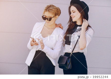 beautiful young girls outdoors in Sunny weather beautiful young girls outdoors in Sunny weather 39952244