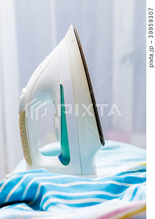 Photo of iron on striped fabric Photo of iron on striped fabric 39959307
