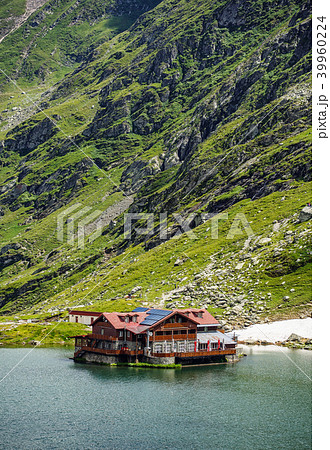 Mountain lake. The lake between the rocks. Beautiful sky with clouds. Wonderful valley. Hiking and 39960224