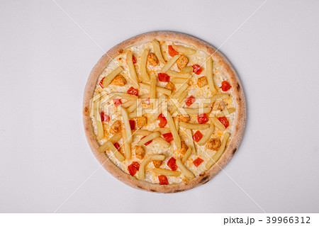 Pizza with chicken, paprika and french fries Pizza with chicken, paprika and french fries 39966312