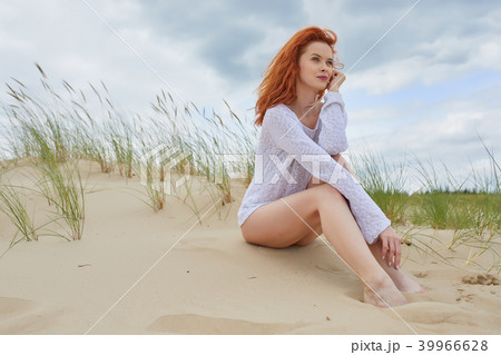 Young woman on sand to beautiful beach, Baltic Sea, Poland 39966628
