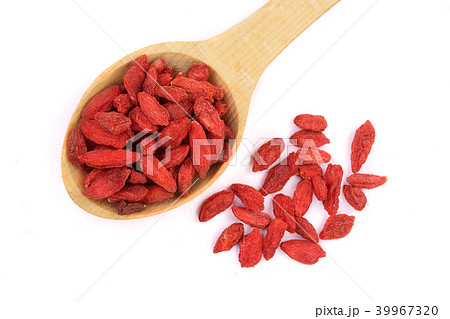 Dried goji berries in wooden spoon Isolated on white background Dried goji berries in wooden spoon Isolated on white background 39967320