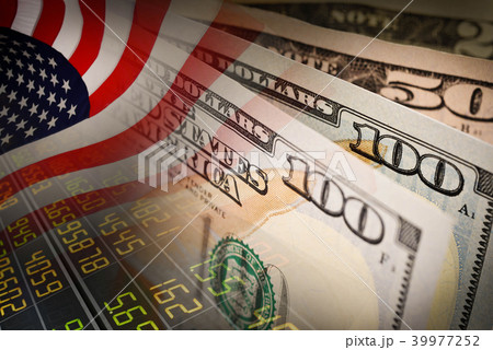 American flag and banknotes (USD) currency 39977252