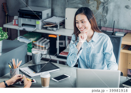 Two colleagues causal meeting at home office Two colleagues causal meeting at home office 39981918