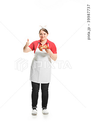 Portrait of cute smiling woman with pastries in her hands in the studio, isolated on white 39987737