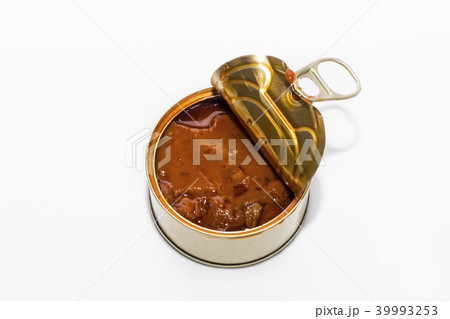Open can with canned seafood close-up on a white b 39993253