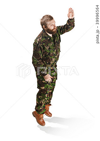 Young army soldier wearing camouflage uniform isolated on white Young army soldier wearing camouflage uniform isolated on white 39996564