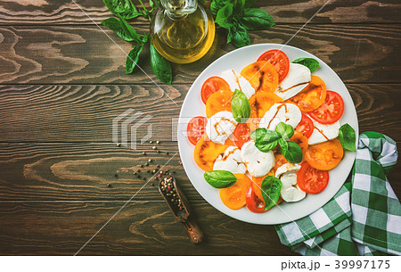 Caprese salad top view. Caprese salad top view. 39997175