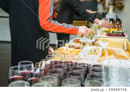 Catering buffet table with food and snacks  39998748
