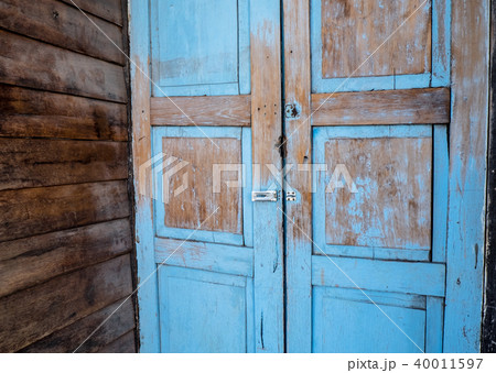 vintage wooden blue door building style 40011597